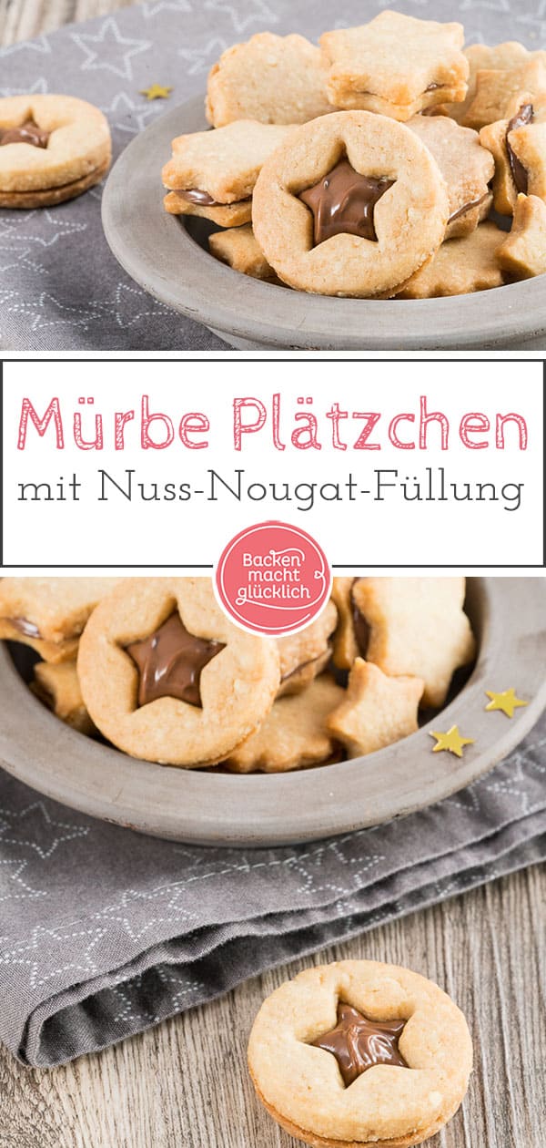 Nuss-Nougat-Plätzchen - mürbe und knusprige Kekse, dazu feines Nougat, das ganze aromatisiert mit etwas Cappuccino. Rein optisch erinnern die Nuss-Nougat-Plätzchen ein wenig an Omas Spitzbuben, der Geschmack geht aber in eine völlig andere Richtung: Richtig schön schokoladig und nussig sind die gefüllten Nougatplätzchen.