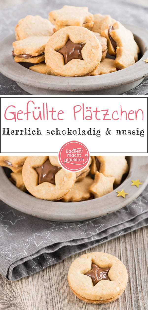 Nuss-Nougat-Plätzchen - mürbe und knusprige Kekse, dazu feines Nougat, das ganze aromatisiert mit etwas Cappuccino. Rein optisch erinnern die Nuss-Nougat-Plätzchen ein wenig an Omas Spitzbuben, der Geschmack geht aber in eine völlig andere Richtung: Richtig schön schokoladig und nussig sind die gefüllten Nougatplätzchen.